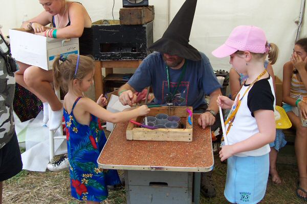 More kids dipping candles
