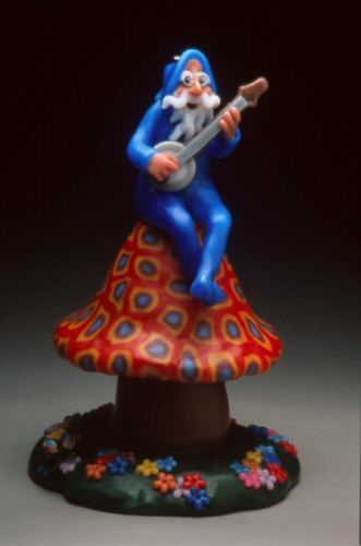 Dwarf with a banjo on a mushroom candle